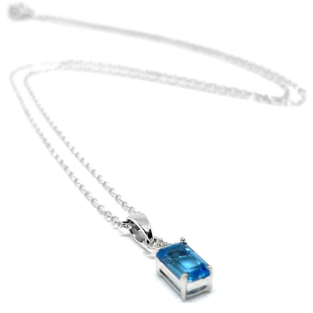 Emerald Cut Blue Topaz & Diamond<BR/>White Gold Pendant